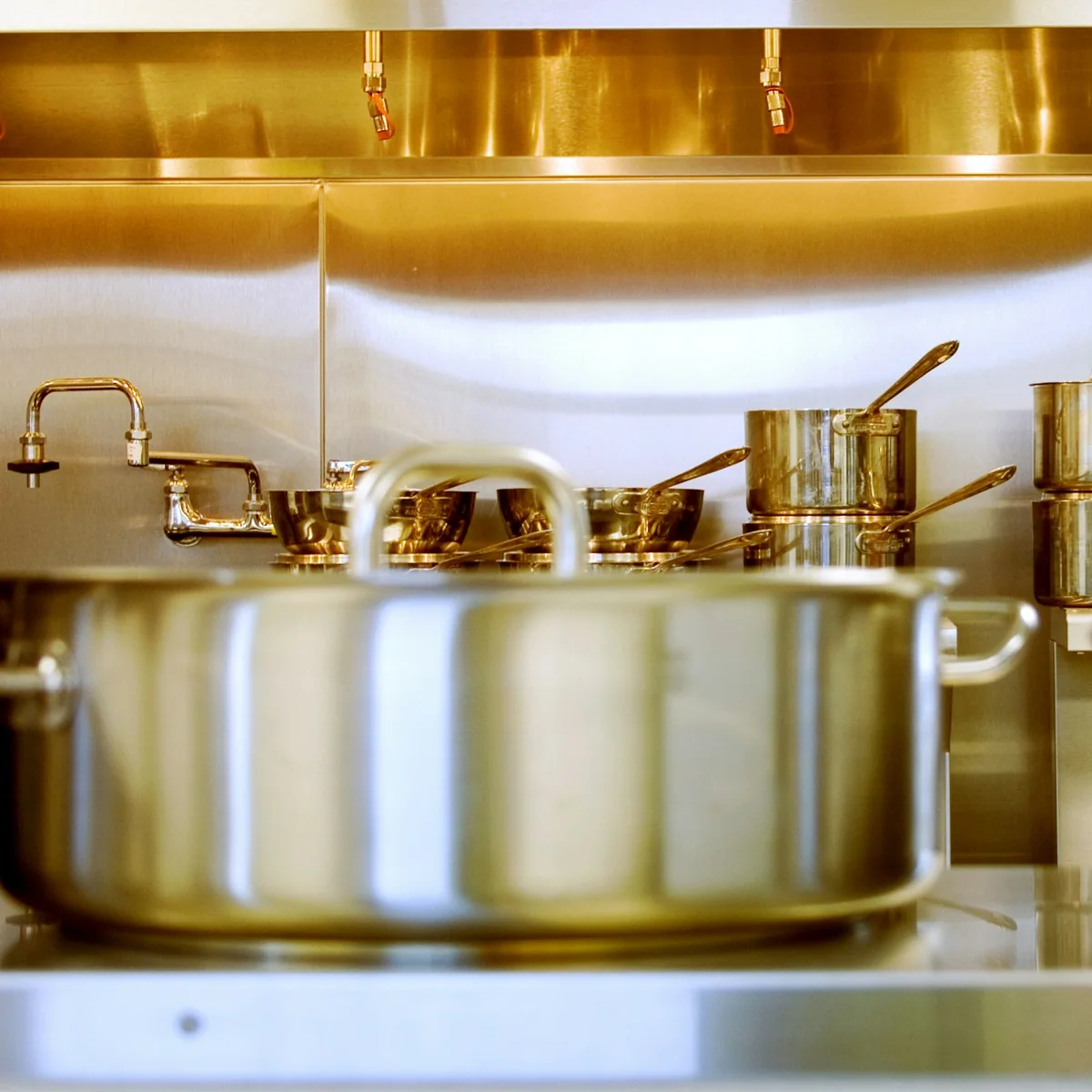 Stainless steel cookware in a professional kitchen