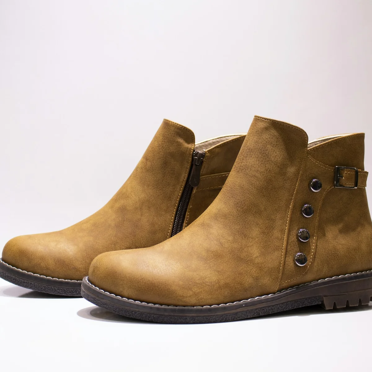 Pair of brown suede ankle boots
